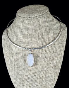 Sterling Silver Pendant with Moonstone.  Member of the feldspar family, the stone has an iridescence of yellow, pink, blue and green. Each stone is handpicked by me for quality and color.  